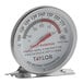 A Taylor 2" Dial Professional Hot Holding Thermometer on a counter.