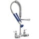 A white and blue Waterloo low profile wall-mounted pre-rinse faucet with a blue and silver hose.