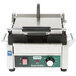 A Waring Panini Perfetto sandwich grill on a professional kitchen counter.