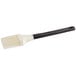 A black and white Matfer Bourgeat silicone bristle pastry and basting brush with a handle.