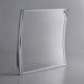 A square mirror with a silver frame.