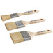 A set of three Ateco pastry and basting brushes with wooden handles.