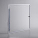 The bottom lid for an Avantco DFF16-HC freezer with a glass door and silver frame.