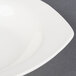 A CAC Ivory square pasta bowl with a small rim.