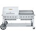 A large stainless steel Crown Verity outdoor grill with a single gas connection.