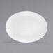 A white oval plate on a gray background.