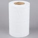 A Lavex Junior white center pull paper towel roll.