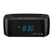 A black digital alarm clock with blue numbers.