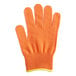 A close-up of a Mercer Culinary orange cut-resistant glove with a yellow band.