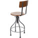 A BFM Seating Lincoln bar stool with a metal frame and autumn ash veneer wood seat and back.