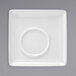 A white square porcelain saucer with a circle in the center.