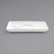 A white rectangular Front of the House porcelain saucer with a circular shape in the middle.