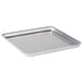 An American Metalcraft heavy weight aluminum square pizza pan on a counter.