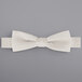 A Henry Segal ivory poly-satin bow tie.