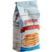 A 5 lb bag of Krusteaz Buttermilk Pancake Mix on a white background.