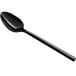 An Acopa Phoenix black stainless steel spoon with a long handle.