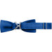 A close-up of a royal blue Henry Segal bow tie with silver buckles.