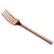 An Acopa Phoenix rose gold stainless steel forged salad/dessert fork.