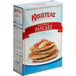 A box of Krusteaz Professional Buckwheat Pancake Mix with a picture of pancakes on the front.