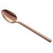 An Acopa Phoenix rose gold stainless steel spoon with a long handle.