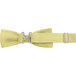 A yellow Henry Segal bow tie with metal buckles.