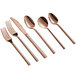 A close-up of a set of Acopa Phoenix rose gold stainless steel bouillon spoons.