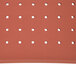 A red Cactus Mat rubber floor mat with holes in it.