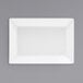 A white rectangular plate on a gray background.