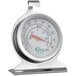 A metal Choice refrigerator/freezer thermometer with a red dial on a stand.