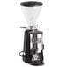 A black and silver Estella Caffe espresso grinder.