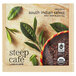 A package of Steep Cafe By Bigelow Organic South Indian Select Black Tea Pyramid Sachets on a wooden surface.