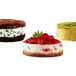 A group of desserts made using Wilton mini springform cake pans on a white background.