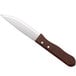 A Choice stainless steel steak knife with a wooden handle.