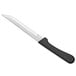 A Choice steak knife with a black handle and a stainless steel blade.