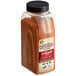 A bottle of Cattlemen's Cowboy BBQ Rub, a container of brown spice powder.