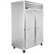 A white Traulsen G Series reach-in freezer with two doors.