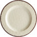 A white Carlisle round melamine plate with a brown rim.