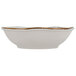 A white bowl with brown rim.