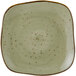 A close-up of a Tuxton TuxTrendz square china plate with brown speckled design.