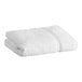 A folded white Lavex Premium bath towel.