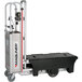 A white Magliner hand truck with a black container on it.