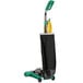 A green and black Bissell Commercial ProShake bagged upright vacuum cleaner with a green handle.