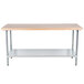 An Advance Tabco wood top work table with a galvanized base and undershelf.