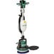 A Bissell Commercial green and white floor machine with a handle.