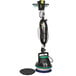 A Bissell Commercial floor machine with a green pad and a black base on a round base.