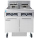 A Frymaster high efficiency commercial electric floor fryer with two open frypots.