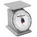 A Cardinal Detecto stainless steel portion scale with a rotating red dial.