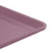 A close-up of a purple rectangular plastic Cambro dietary tray.