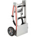 A Magliner hand truck with curved back and black wheels.