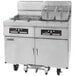 A Dean liquid propane gas floor fryer with built-in filtration and two frypots on wheels.
